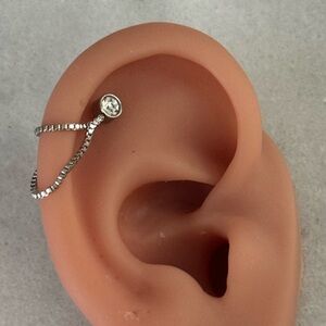 New Drop! Silver Crystal Chain Jacket Cuff Earring 

Brand New

Stainless Steel